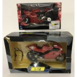 2 boxed 1:12 scale, motorcycle diecast models.