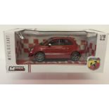 A boxed 1:18 scale, Abarth 500 in red by Mondo Motors.