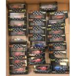 A box containing 26 assorted Onyx F1 boxed collectors racing car models from the 1991 & 92 seasons.