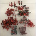 A collection of 100+ vintage plastic guardsmen figures to include bandsmen.