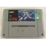 An unboxed Super Nintendo SNES games cartridge Mega Man X, PAL Version.