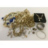 A collection of vintage and modern silver & costume jewellery, together with a silver napkin ring.
