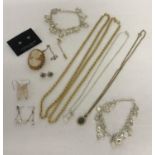 A small collection of costume and silver jewellery.