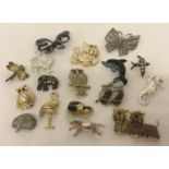 A collection of vintage and modern animal and insect design brooches.