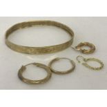 A small quantity of scrap gold jewellery. Hallmarked or tests as 9ct gold.