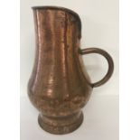 A large vintage copper jug, possibly French.
