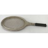 A vintage silver plated Taunton Silversmiths tennis racket shaped trivet.