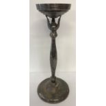 A large silver plated wine cooler/champagne bucket stand with channelled detail to top rim.