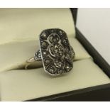 An Art Deco 9ct gold and silver vintage dress ring set with marcasite's.