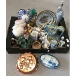 A box of mixed vintage and modern ceramics and misc. items.