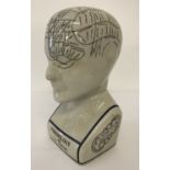 A ceramic L.N. Fowler phrenology head, with crazed glaze effect.