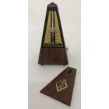 A vintage wooden cased metronome by Wittner, made in West Germany. In working order.