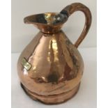 An antique copper 1 gallon haystack ale jug with leaded stamp mark and brass plaque.
