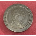 A George III 1797 cartwheel penny. Complete with small round clear plastic case.