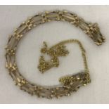 A 9ct scrap gold bracelet and part chain. Marked or tests as 9ct gold.