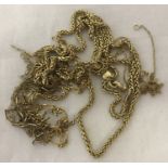 A quantity of scrap gold chain necklaces. Hallmarked or tests as 9ct.