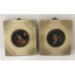 A pair of framed and glazed miniatures, in ivory coloured frames.