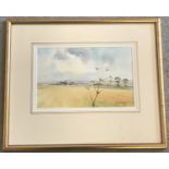 A gilt framed and glazed watercolour of a rural landscape by John R Pretty. Signed to bottom right.