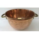 A very large Victorian copper and brass dome based candy pan with riveted handles.