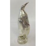 A heavy silver plated novelty penguin shaped sugar sifter.