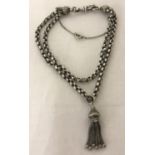 A vintage double row, silver belcher chain bracelet with tassel charm and safety chain.