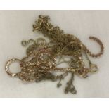 A quantity of 9ct gold broken chains suitable for scrap.