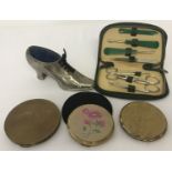 A vintage shoe shaped pin cushion together with 3 vintage compacts; 2 by Stratton & a manicure set.