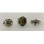 3 silver stone set dress rings.