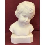 A white alabaster bust of a child, signed to side D.David.