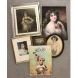 A collection of framed and unframed assorted pictures.