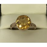 A vintage 9ct gold dress ring set with a large round cut Citrine approx. 4ct.