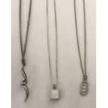 3 silver necklaces. A twist design pendant on a fine belcher chain.