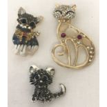 3 costume jewellery stone set brooches in the shape of cats.