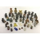 A collection of miniature and small pewter, ceramic, glass and metal teddy bears.
