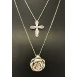 2 silver necklaces. A Silver rose pendant on a 18" fine curb chain.