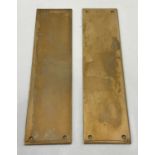 A pair of vintage brass door finger plates.