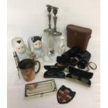 A quantity of assorted misc. items to include leather cased binoculars, Rolls razor and radios.