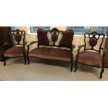 A Victorian 2 seater wooden framed Parlour suite; settee with 2 matching arm chairs.