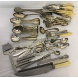A collection of vintage silver plated cutlery.
