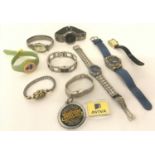 A collection of vintage and modern wristwatches, mostly women's.