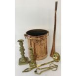 A small collection of vintage copper and brass items to include candle sticks, ladle & coal scissors
