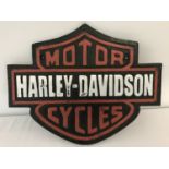 A painted cast metal Harley Davidson Motor Cycles wall hanging plaque.