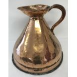 An antique copper 4 gallon haystack jug with riveted handle and dovetail joint.