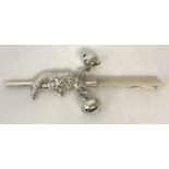 A 925 silver, pearl handled babies rattle in the shape of Mr. Punch.