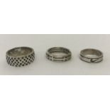 3 silver and white metal band style rings.