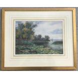 A framed and glazed watercolour of wherries on the Norfolk broads.