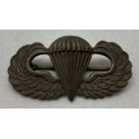 A US late WWII style paratroopers pin back badge.