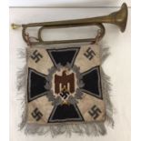 A German WWII style brass Police trumpet with banner.