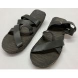 A pair of sandals made from recycled truck tyres. Made in Vietnam.