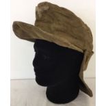 A WWII style German Luftwaffe D.A.K Africa Corps desert field cap with neck cover.